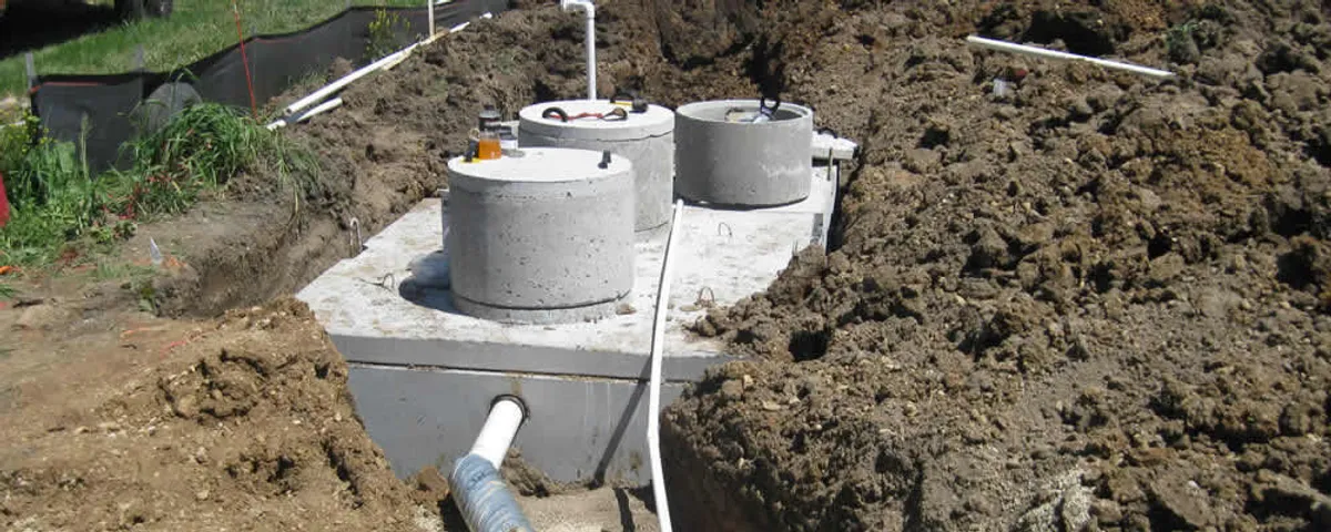 Septic system repair and installation site with tank access ports in Clearwater, FL